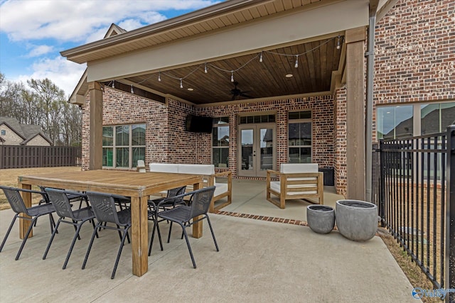 view of patio featuring ceiling fan