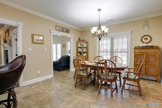 dining area with a notable chandelier, baseboards, crown molding, and visible vents