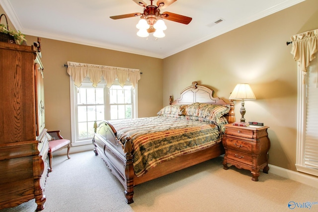 bedroom featuring visible vents, carpet, and ornamental molding