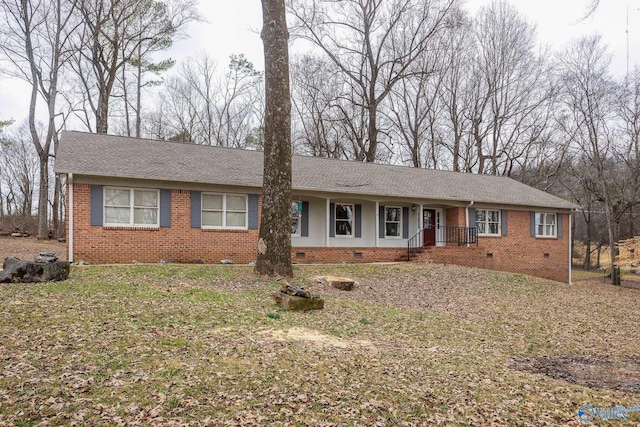 ranch-style home with a front lawn