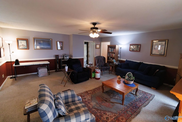 living room with carpet and ceiling fan