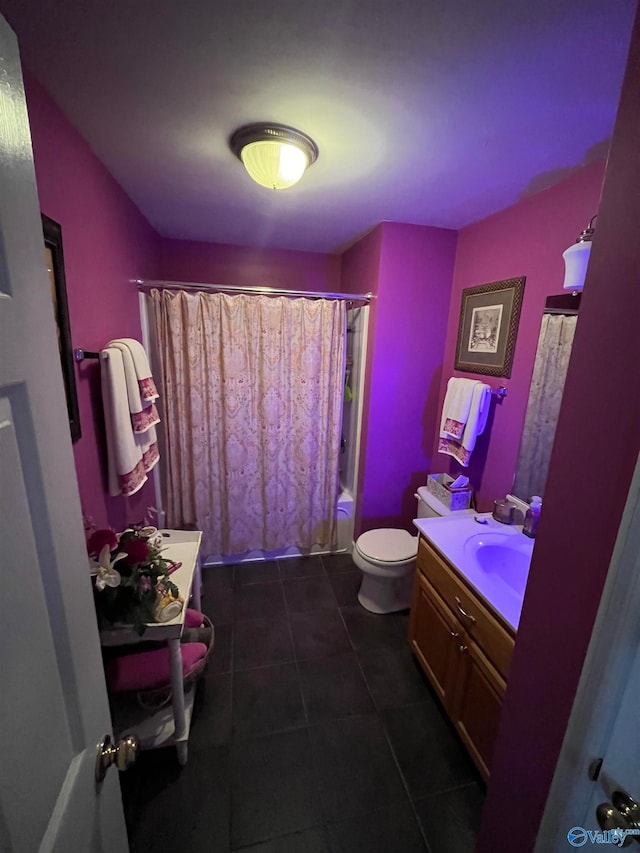 full bathroom with tile patterned floors, shower / bath combination with curtain, vanity, and toilet