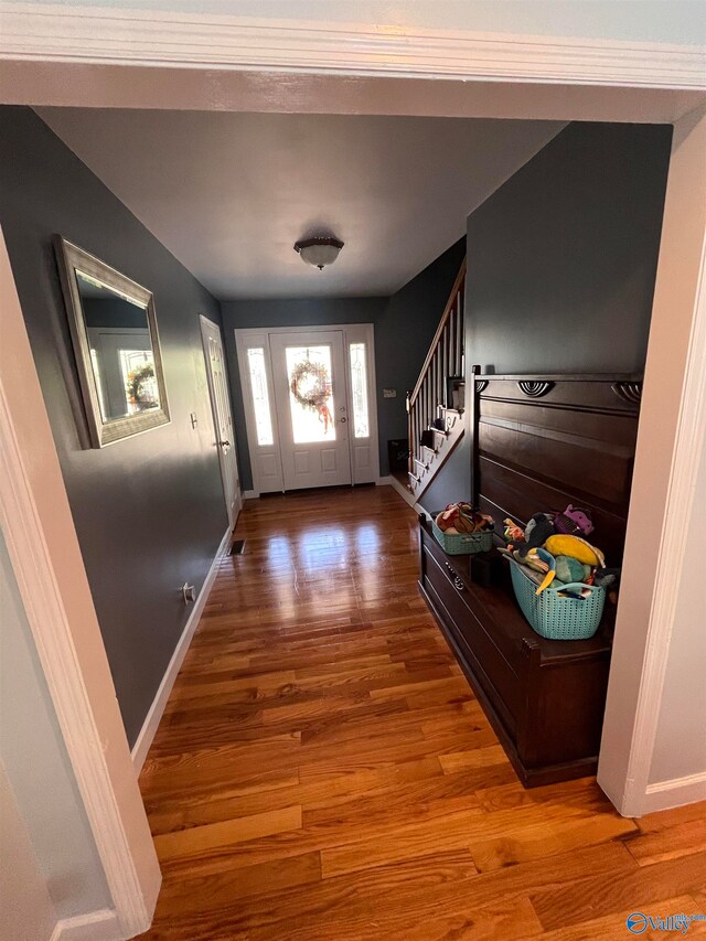 doorway featuring wood-type flooring