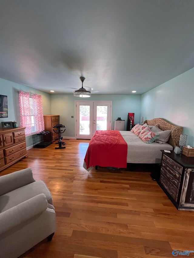 bedroom featuring hardwood / wood-style floors and ceiling fan