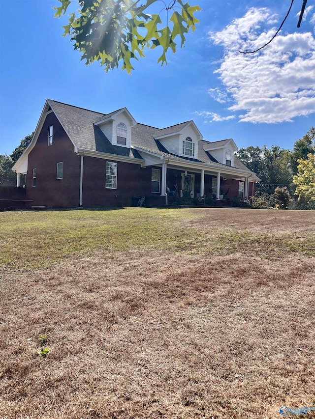 ranch-style home with a front lawn