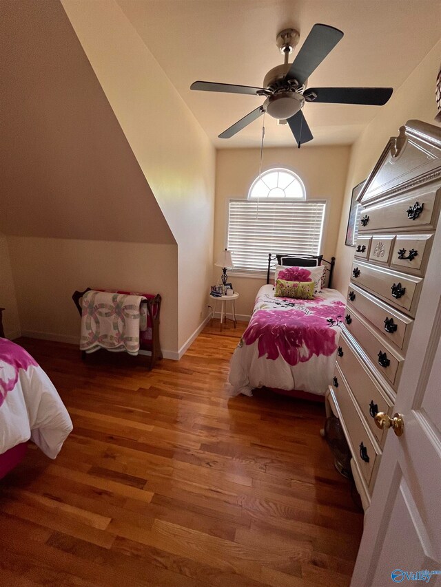 bedroom featuring ceiling fan and hardwood / wood-style floors