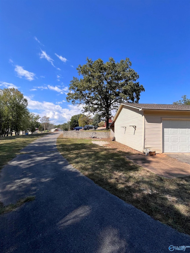 exterior space featuring a garage