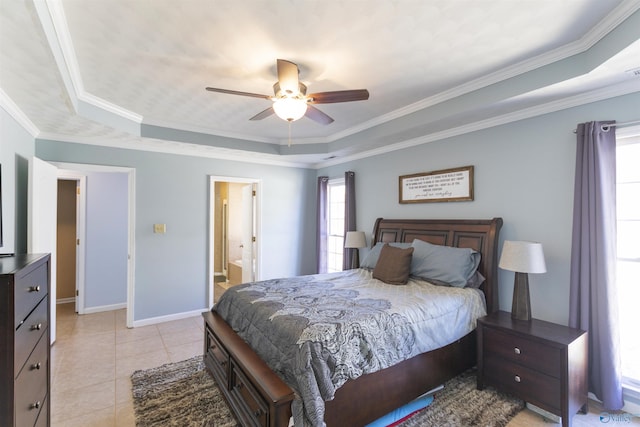 bedroom with baseboards, light tile patterned flooring, ceiling fan, crown molding, and a raised ceiling