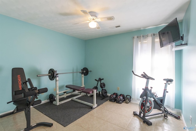 workout area featuring plenty of natural light, baseboards, and visible vents