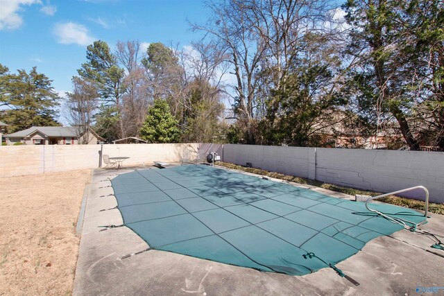 view of pool featuring a fenced in pool, a patio, and a fenced backyard