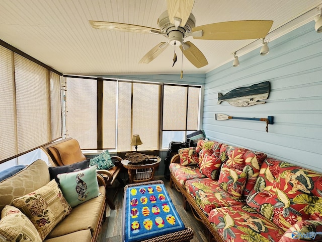 sunroom / solarium featuring an outdoor hangout area and ceiling fan