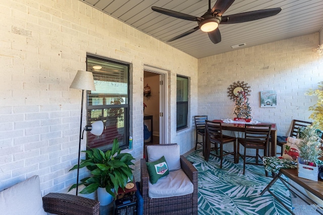 view of patio / terrace featuring ceiling fan