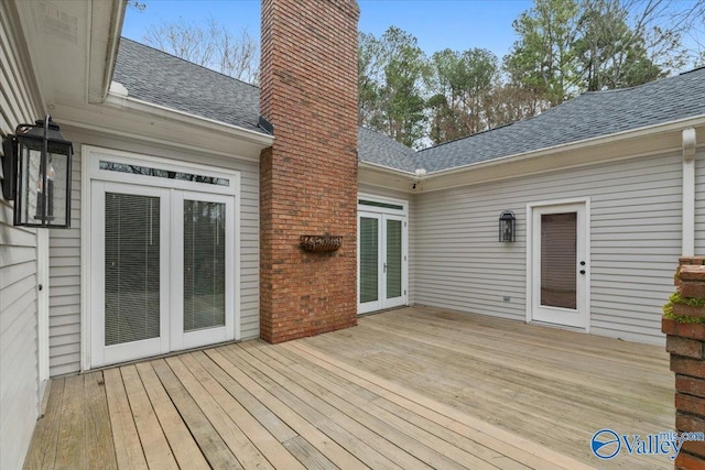 wooden deck featuring french doors