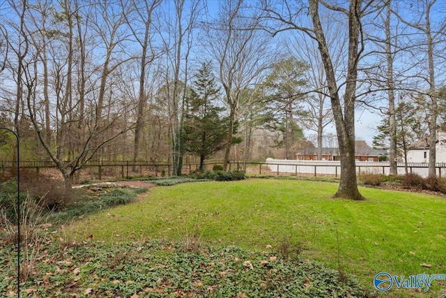 view of yard with fence