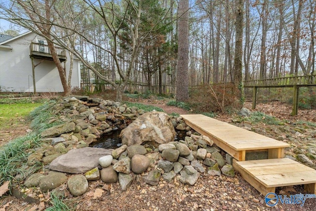 view of yard with fence