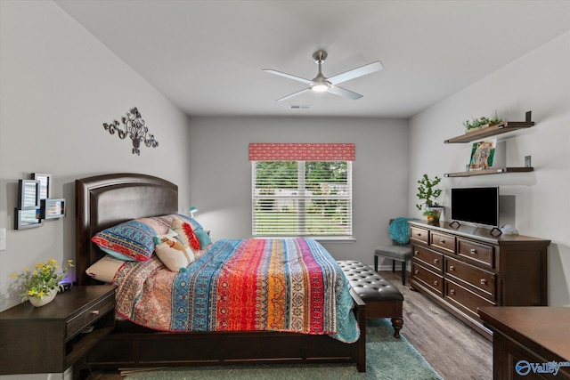 14930 Eva Cir, Athens, AL 35613 - bedroom with wood finished floors and ceiling fan