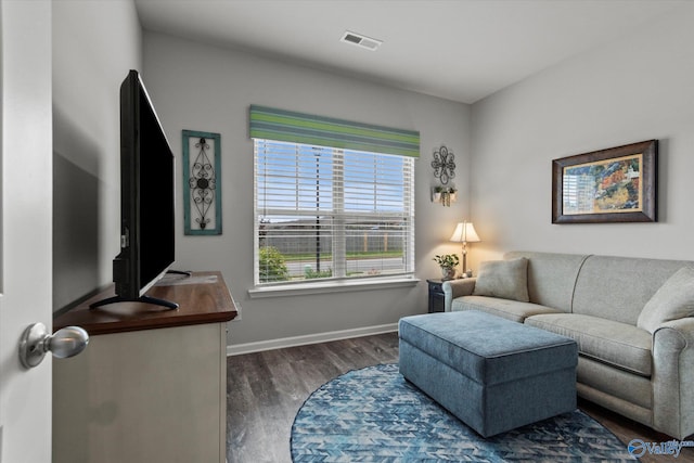 14930 Eva Cir, Athens, AL 35613 - living area featuring dark wood-style flooring and baseboards
