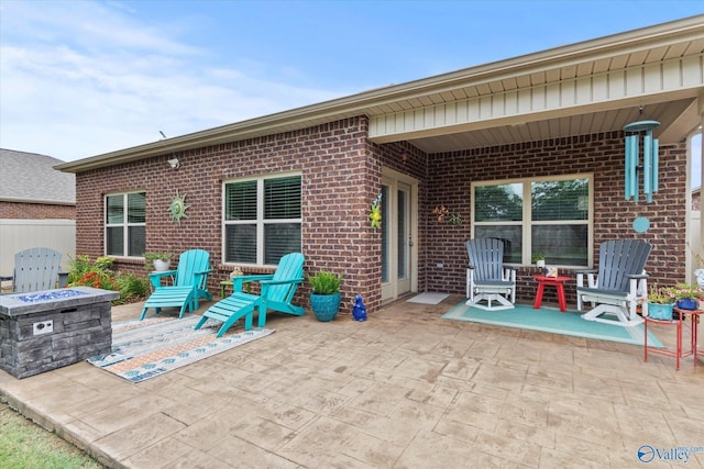 14930 Eva Cir, Athens, AL 35613 - view of patio / terrace with a fire pit