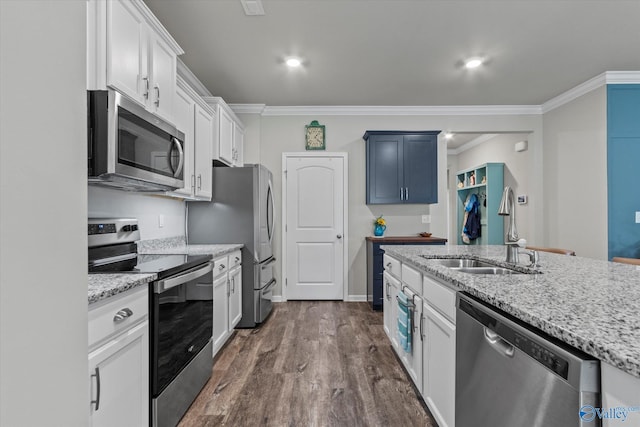 14930 Eva Cir, Athens, AL 35613 - kitchen featuring appliances with stainless steel finishes, crown molding, light stone countertops, white cabinetry, and dark wood-style flooring