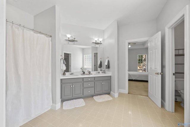 bathroom with vanity and toilet