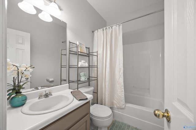 full bathroom with vanity, shower / bath combo, toilet, and tile patterned flooring