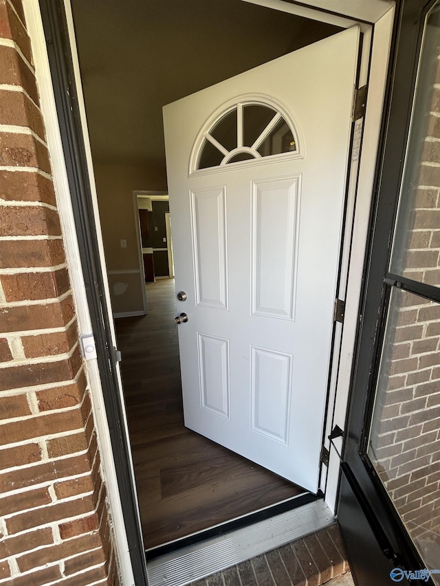 393 Canadian Dr, Scottsboro, AL 35769 - doorway to property with brick siding