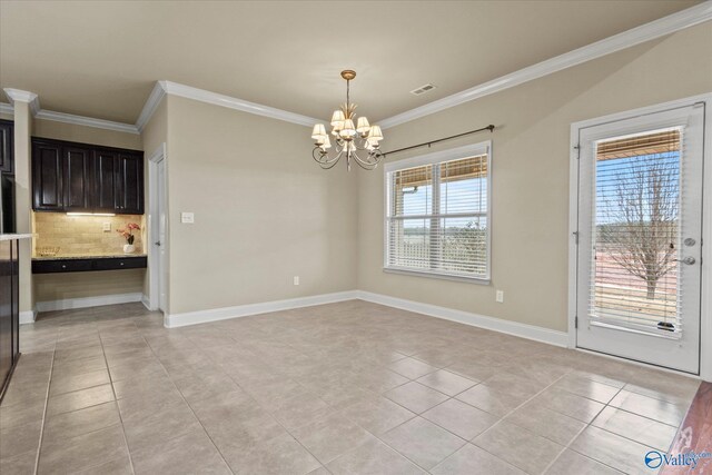 unfurnished dining area featuring light tile patterned floors, a chandelier, and ornamental molding