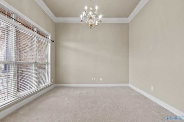 spare room featuring crown molding, light carpet, and an inviting chandelier