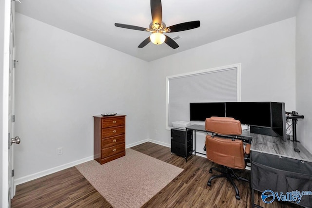 office space with ceiling fan and dark hardwood / wood-style floors