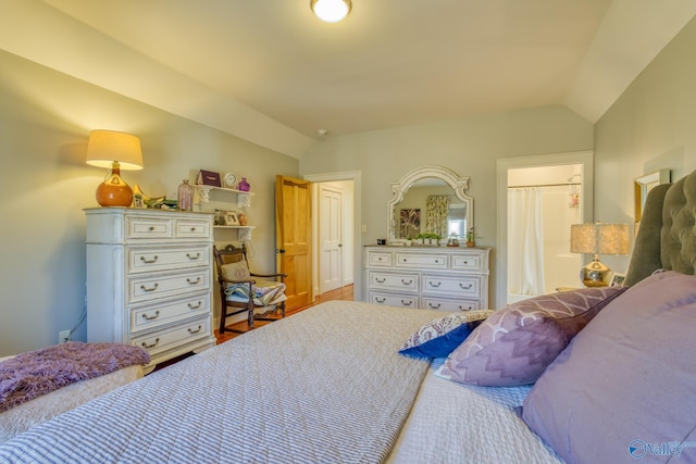 bedroom featuring vaulted ceiling