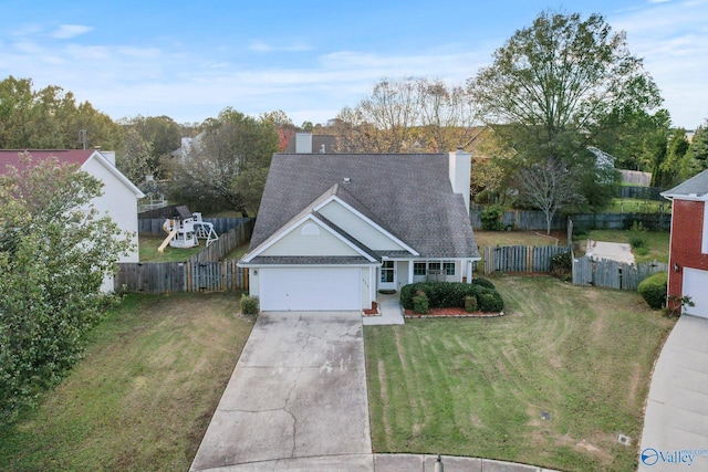 view of front facade featuring a front lawn and a garage