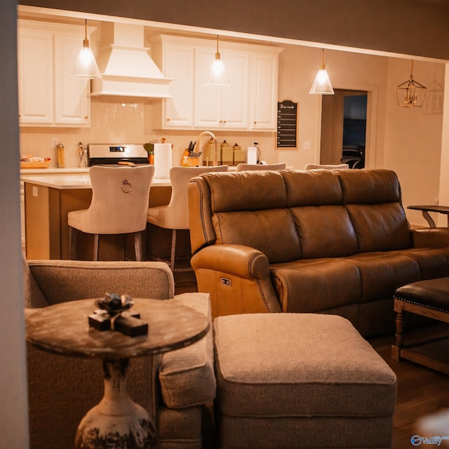living area featuring dark wood-style floors
