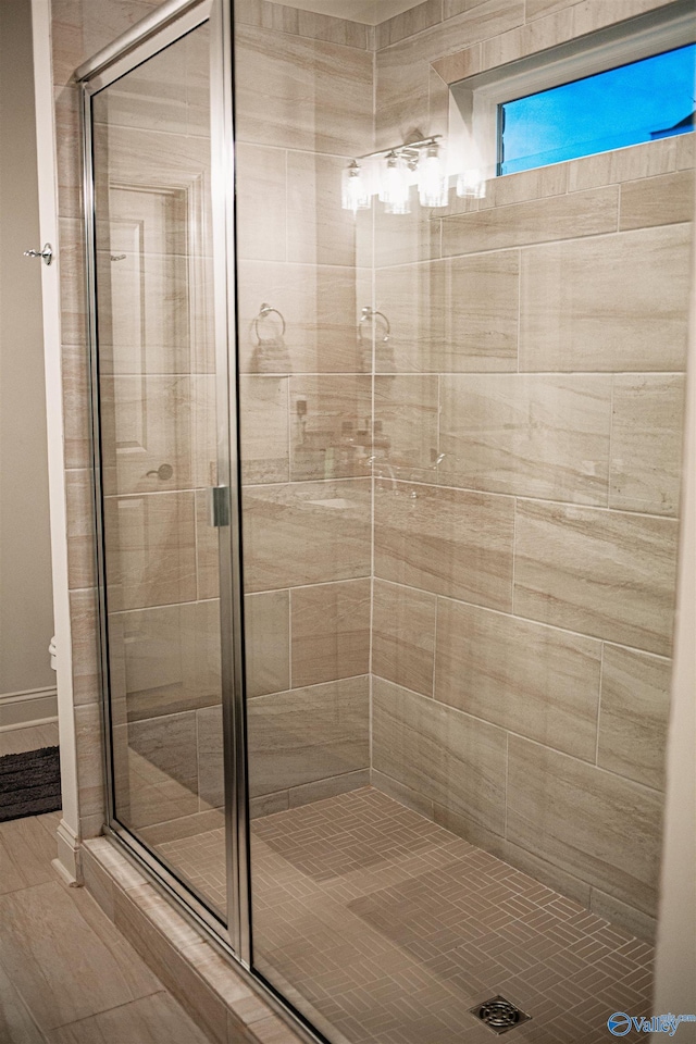 full bath featuring a stall shower