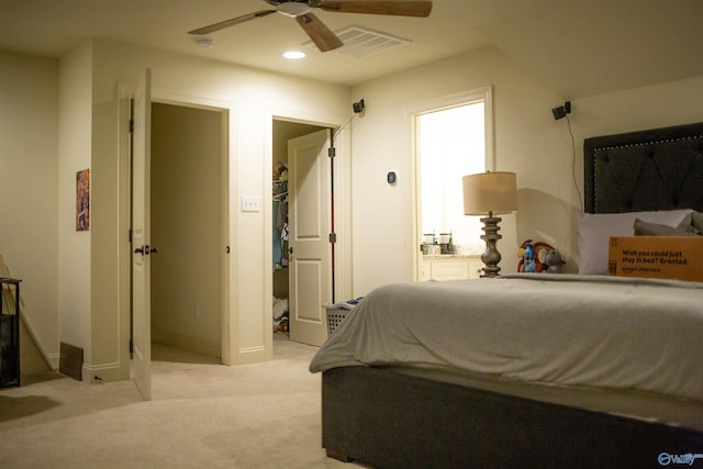 bedroom featuring a ceiling fan, recessed lighting, light colored carpet, and visible vents