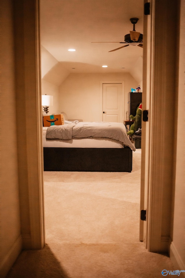 carpeted bedroom with recessed lighting, ceiling fan, and vaulted ceiling