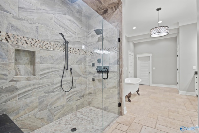 bathroom featuring shower with separate bathtub