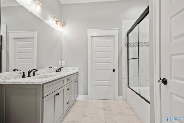 bathroom featuring vanity and enclosed tub / shower combo