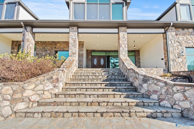 doorway to property with a porch