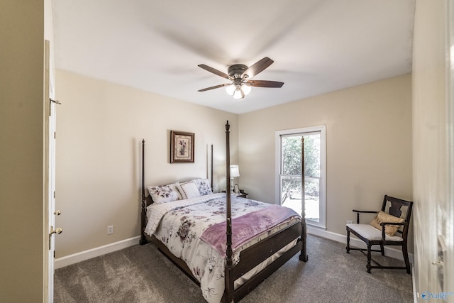 bedroom with ceiling fan, baseboards, and dark colored carpet