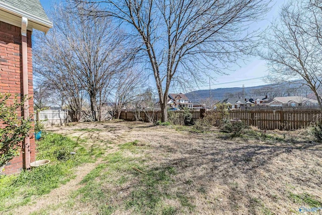 view of yard featuring a fenced backyard