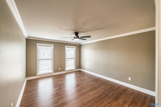 spare room featuring ceiling fan, dark hardwood / wood-style flooring, and ornamental molding