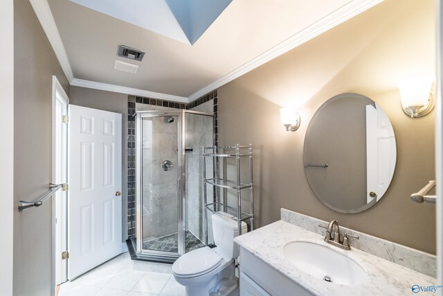 bathroom with tile patterned flooring, vanity, toilet, and crown molding