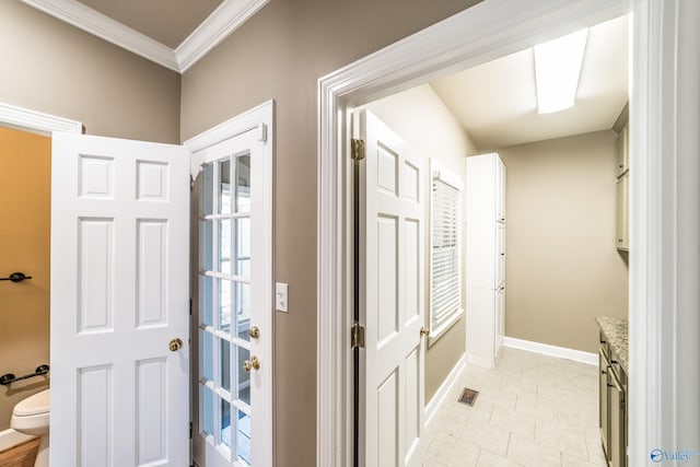 corridor with crown molding