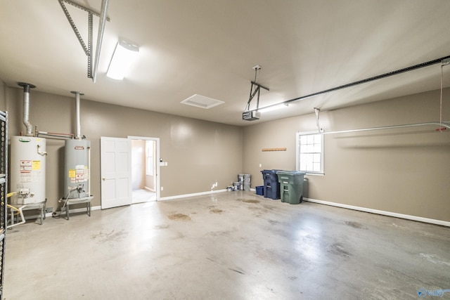 garage featuring a garage door opener and water heater