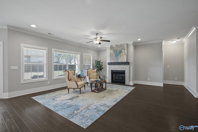 unfurnished room featuring a ceiling fan, baseboards, recessed lighting, ornamental molding, and dark wood-type flooring