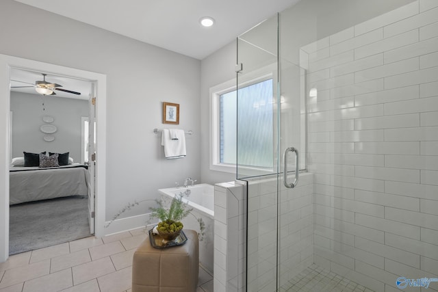 ensuite bathroom featuring tile patterned flooring, connected bathroom, a garden tub, a stall shower, and a ceiling fan