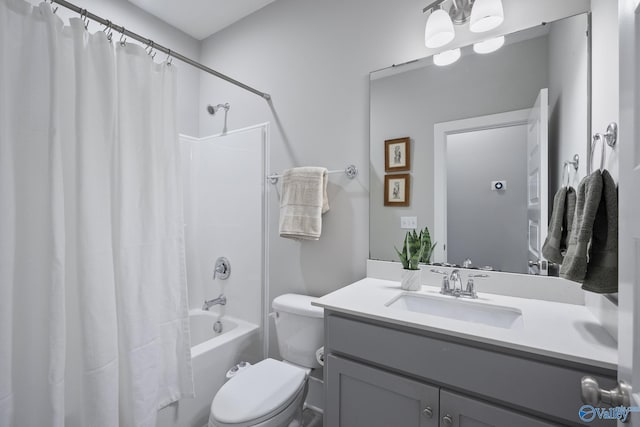 bathroom with vanity, toilet, and shower / tub combo with curtain