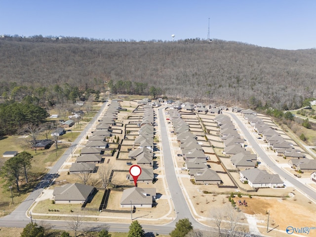 aerial view with a wooded view