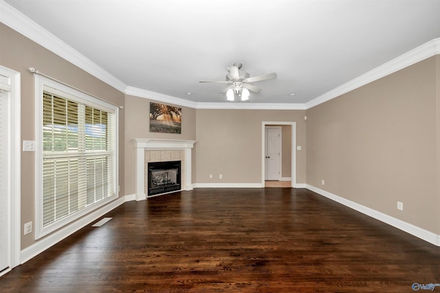 22656 Riviera Dr, Athens, AL 35613 - unfurnished living room featuring ceiling fan, ornamental molding, a fireplace, dark wood-style floors, and baseboards