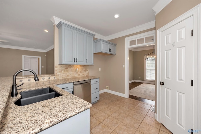 22656 Riviera Dr, Athens, AL 35613 - kitchen featuring a sink, stainless steel dishwasher, tasteful backsplash, light stone counters, and gray cabinetry